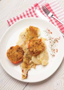 Raya al horno con patatas: vaca de mare la cuptor cu cartofi, pește de subzistență devenit clasic
